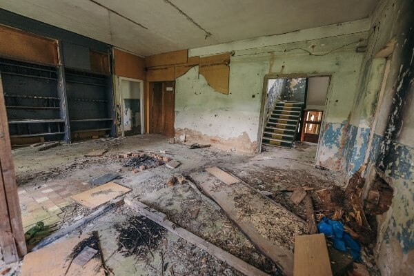 A basement is completely gutted, ready to be fully remodeled.